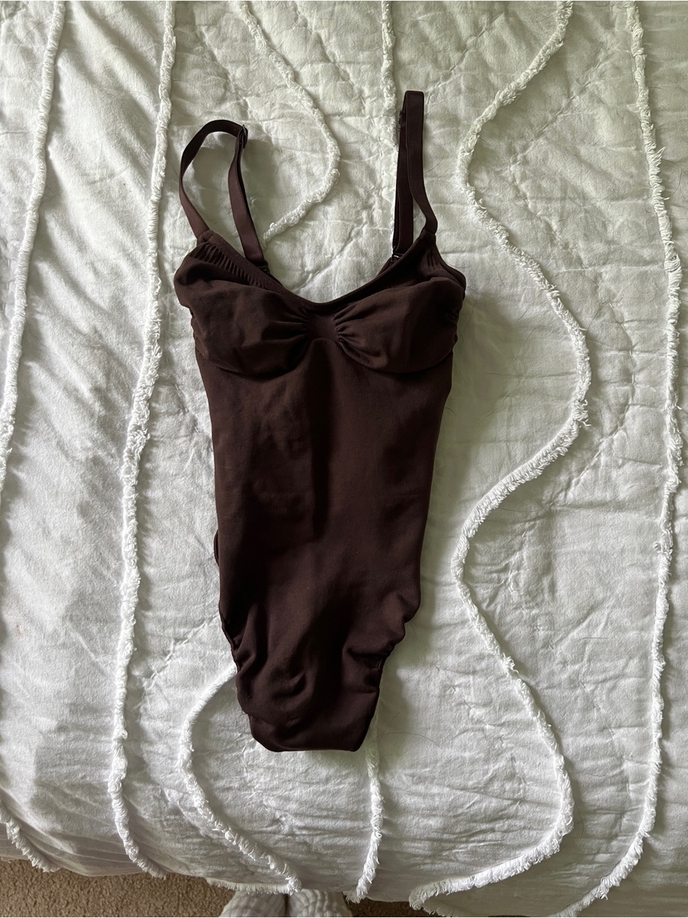 Skims seamless sculpt thong bodysuit in the shade cocoa. Worn twice.